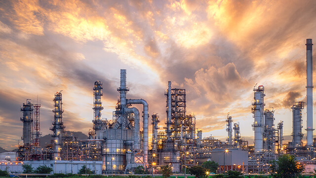 petrochemical plant orange purple sky
